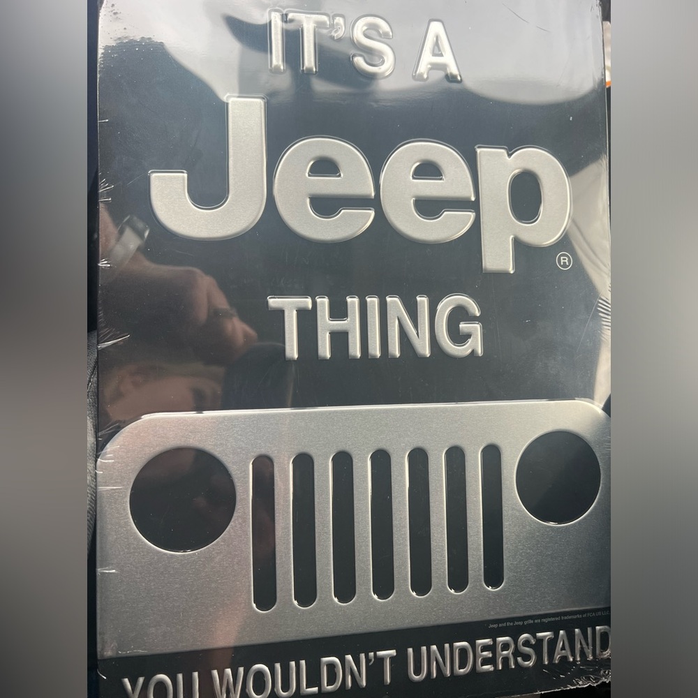 Black silver JEEP metal sign
